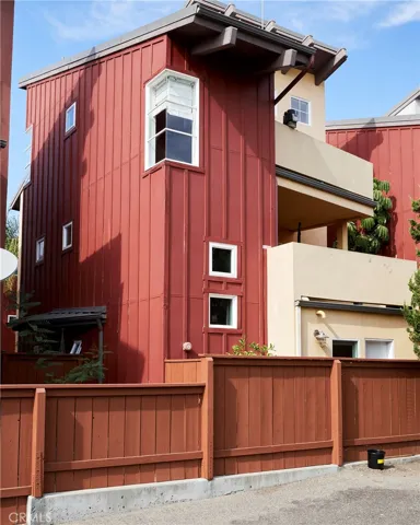 Southern rear view of the home showing the decks and levels.