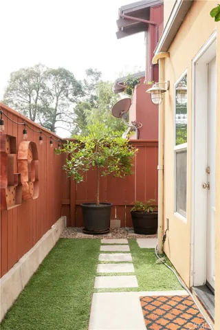 rear yard perfect for your 4 legged family members, complete with doggie door access.