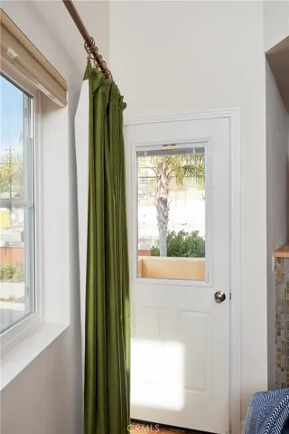 small balcony at the front of the home on 2nd level