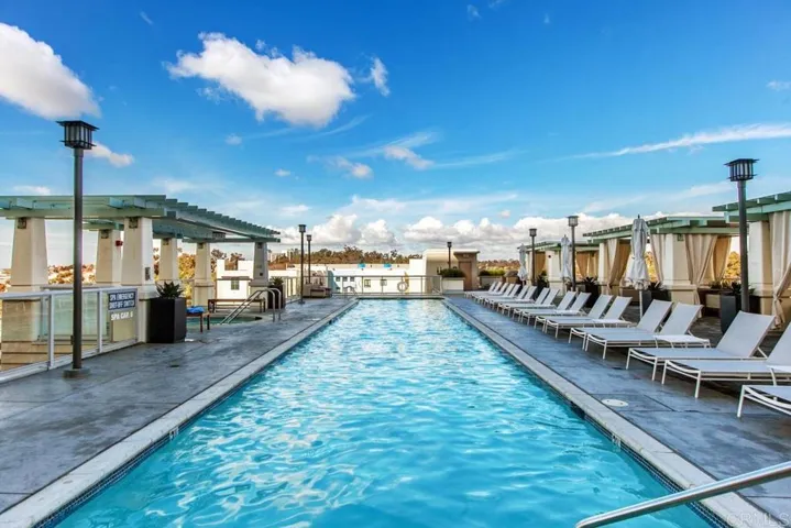 Rooftop Pool with expansive views, cabanas, jacuzzi, BBQ & firepits.
