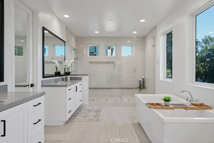 Chrome Moen "Voss" Series fixtures in ALL bathrooms