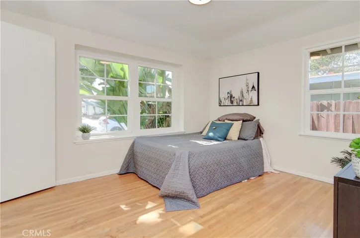 All bedrooms have original hardwood flooring, large windows and new fixtures.