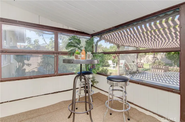 Covered rear porch expands the living space and provides access to private rear yard.