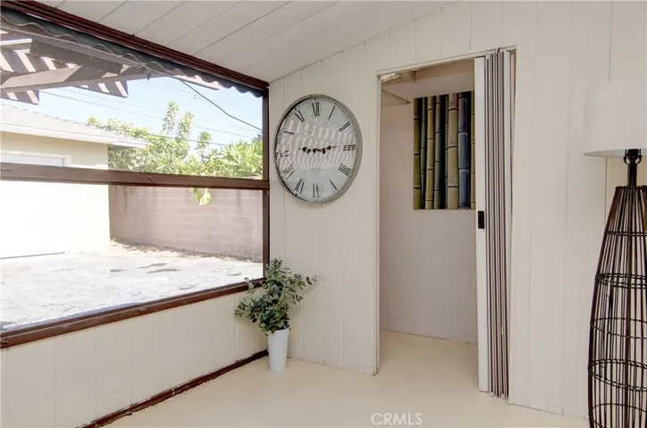 Convenient laundry space is accessed from rear porch.