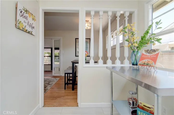 Kitchen nook area provides extra storage, prep or informal dining space.