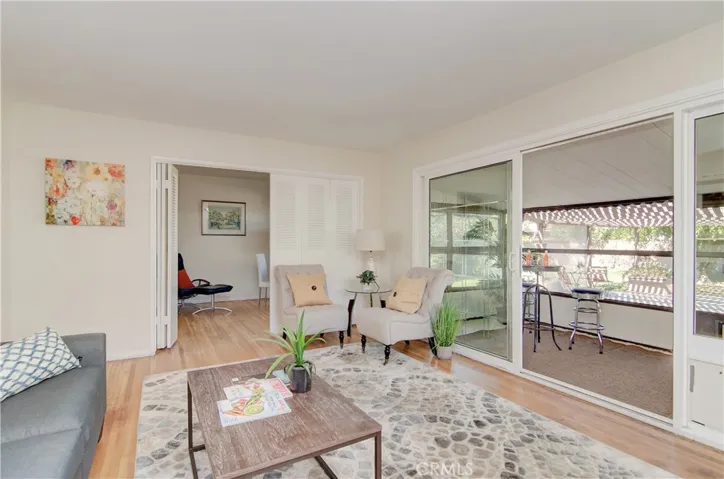 Original oak hardwood flooring graces most areas of the home.  Huge slider offers seamless transition porch and outdoors.