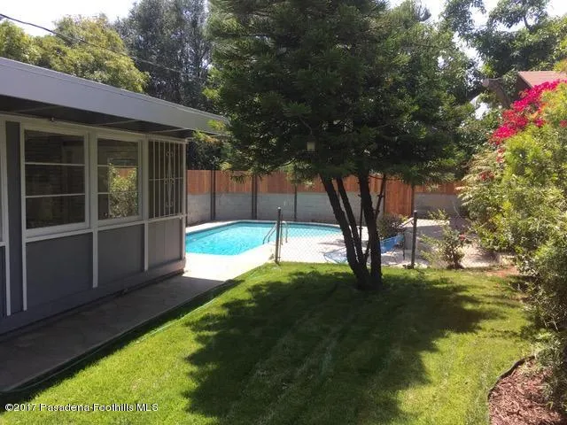 n back yard and pool