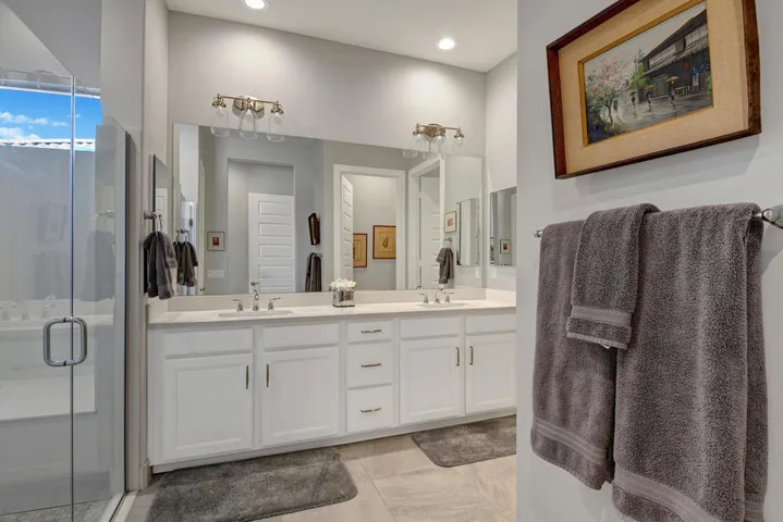 046 PRIMARY BATHROOM THROUGH MLS