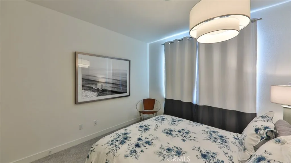 Secondary bedroom with queen bed.