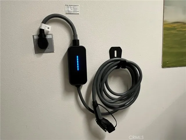 EV charger in 2-car attached garage, direct access.