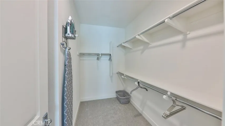 Walk-in closet at master suite.