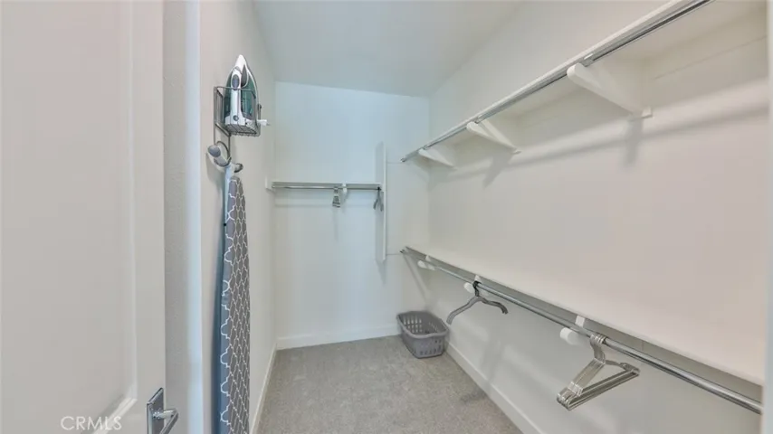 Walk-in closet at master suite.