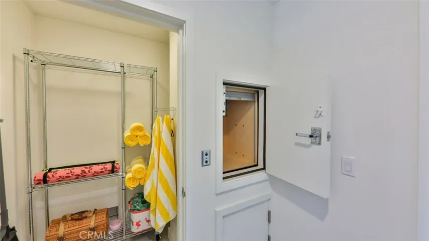 Renters closet and dumb waiter at entrance.