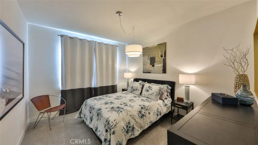 Secondary bedroom with queen bed.