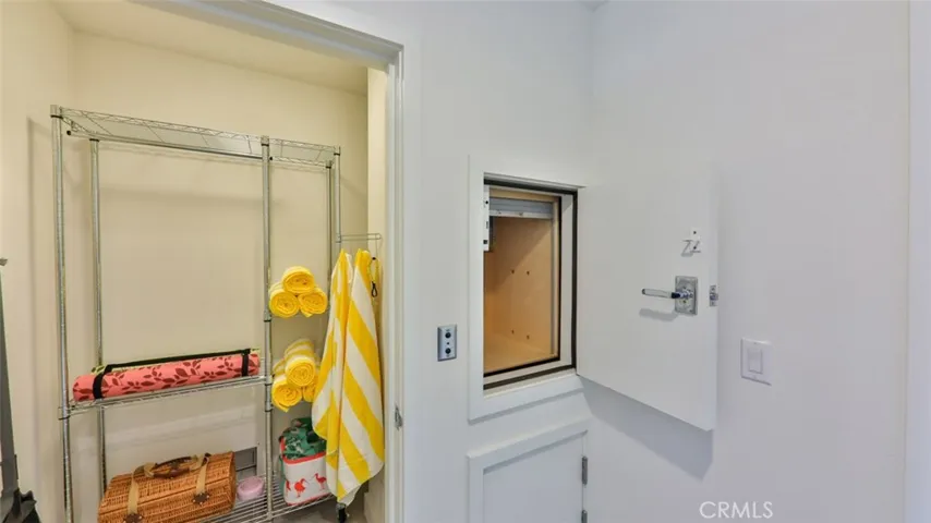 Renters closet and dumb waiter at entrance.
