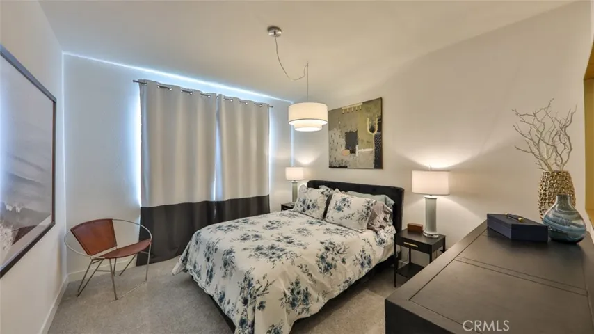 Secondary bedroom with queen bed.