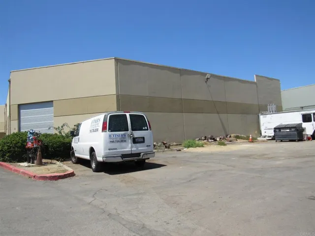 2 rolling doors with 9 parking spaces