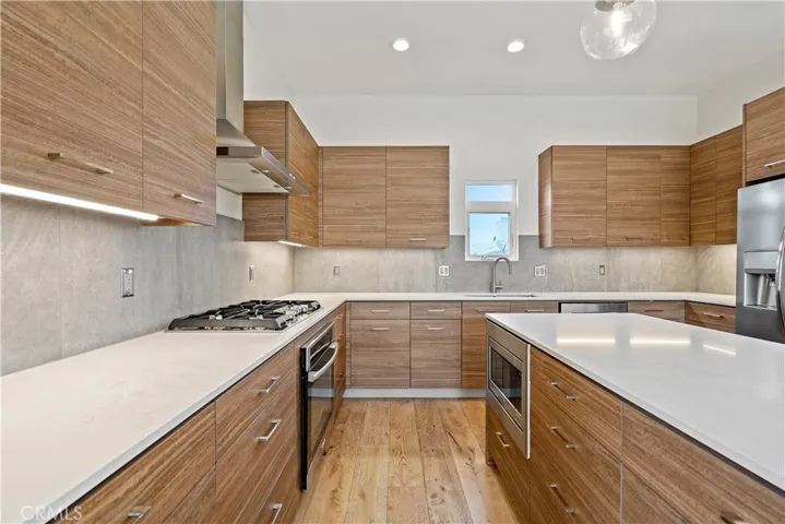 Lots of counter space for multiple chefs in the kitchen