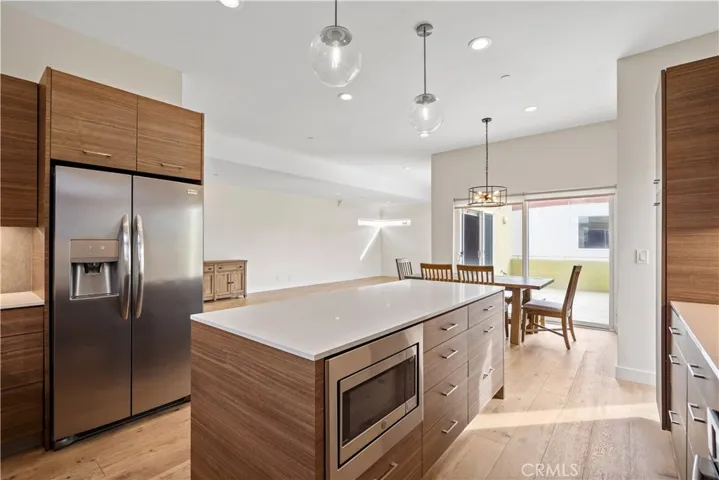 Open concept so can still mingle with your guests while prepping in the kitchen