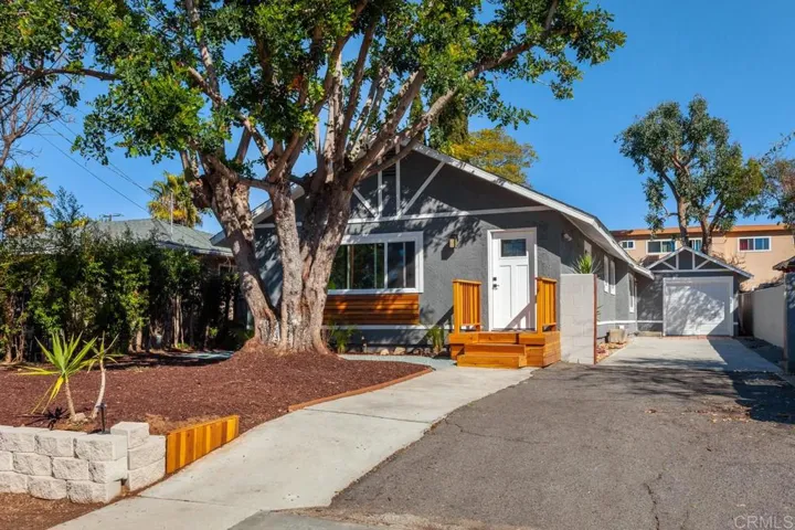 Beautifully remodeled 4 bed 3 bath.  A 1 bed one bath suite has it's own entrance near the garage