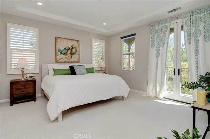 This grand master suite has views for days. The balcony is the perfect spot to enjoy some quiet time.