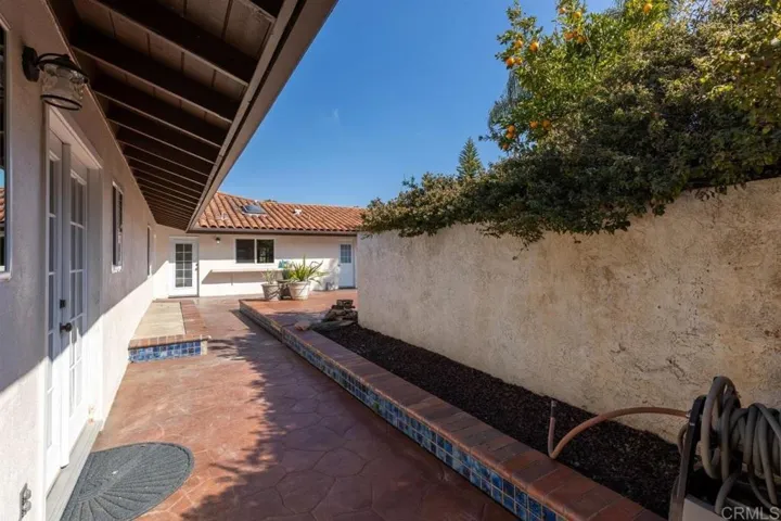 Right outside the French doors out of master bathroom.