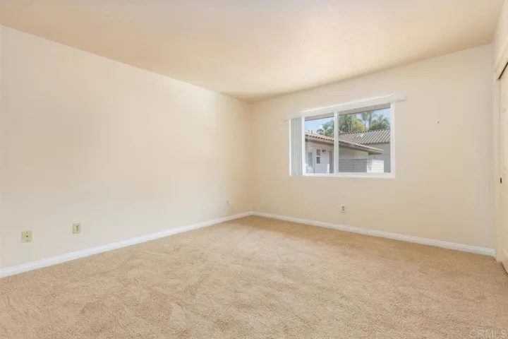 Bedroom #2 with new carpeting.