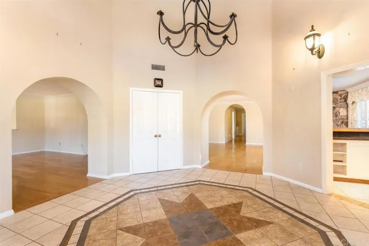 Wet bar entrance to right side of entry tower.