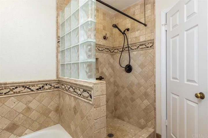 Shower in hall bathroom.