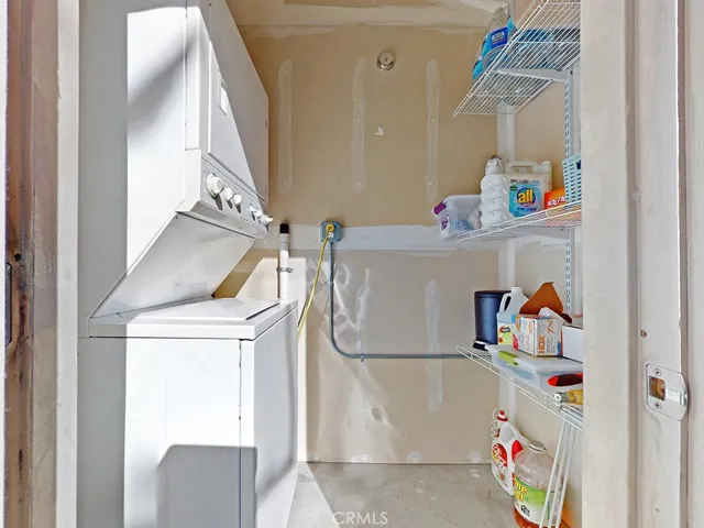 Laundry and storage area off lower exterior deck