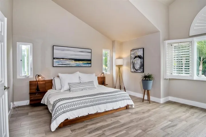 Spacious master bedroom. Notice the porcelain wood floors - in the master and throughout most of the house.