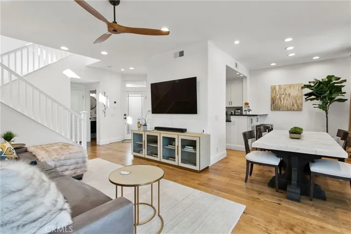 Natural light floods every space; note Formal Dining plus wine/breakfast bar.
