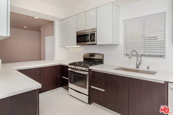 Windowed Kitchen open to den/study