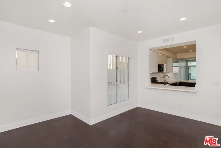 den/office open to kitchen