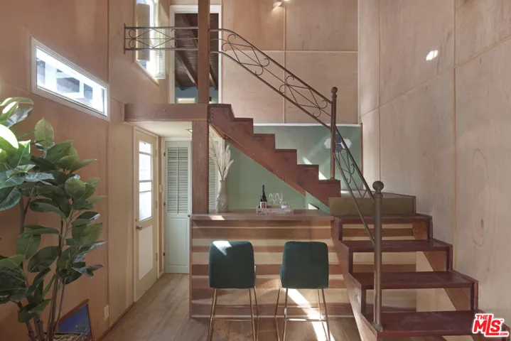 Stairs to primary bedrm