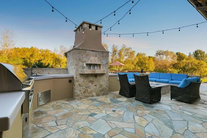 With wood burning Pizza Oven and nearby firepit with seating for 12.