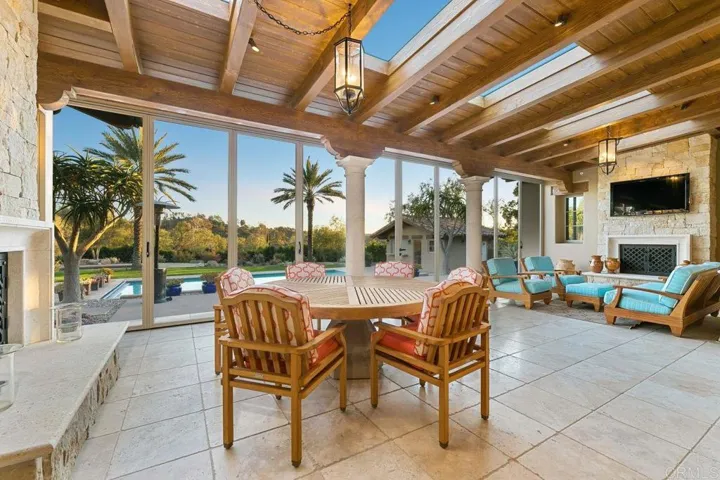 Loggia with over 710 sq. ft. of indoor/outdoor living. 2 fireplaces, heaters for year round living.