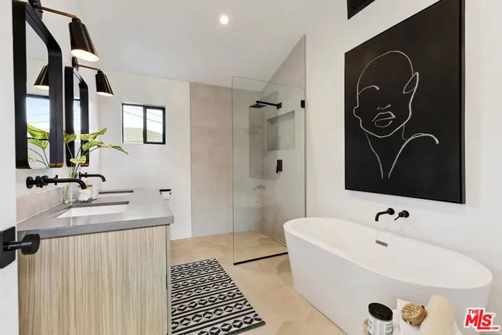 Master ba wi soaking tub and zero-edge shower