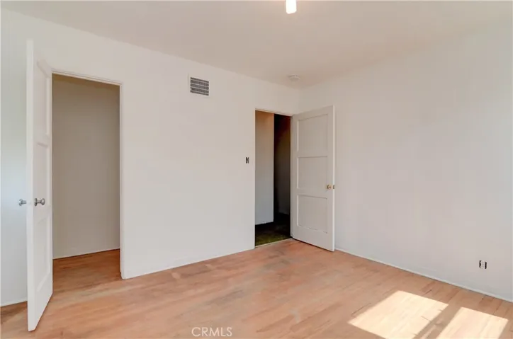 Bedroom #1 boasts good sized closet  and tons of natural light. Just painted too!