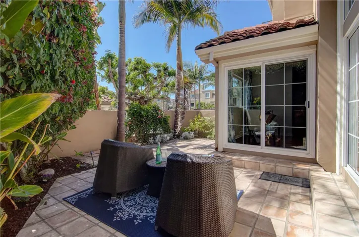 Private rear yard area has lush landscape and allows for EZ living AND EZ entertaining...