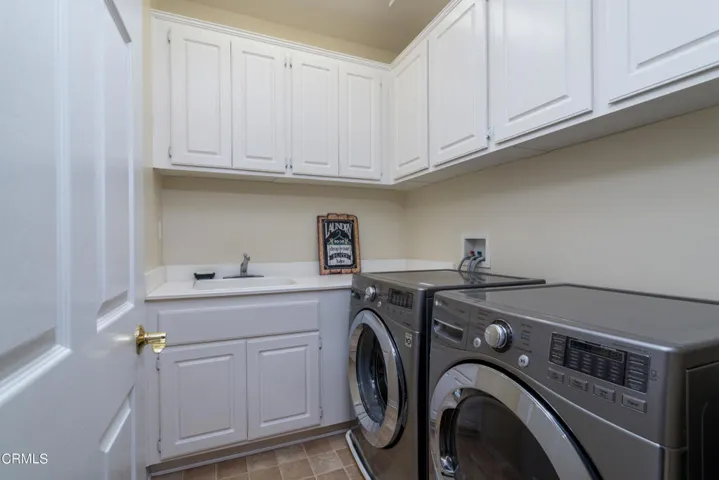 Well Appointed Upstairs Laundry Room