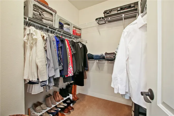 Walk-in closet off of the master bathroom area.