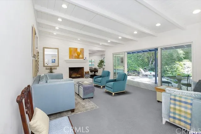 Living Room & Patio (some furnishings have been digitally staged)
