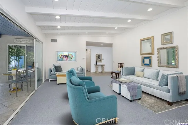 Entry, Living Room & Patio (some furnishings have been digitally staged)