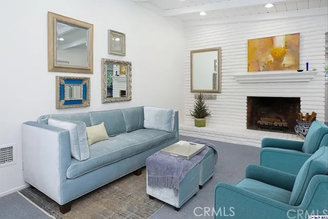 Living Room & Fireplace (some furnishings have been digitally staged)