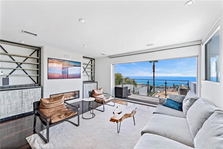 This home has it all - tasteful design, quality finishes, and gorgeous, sit-down ocean views!