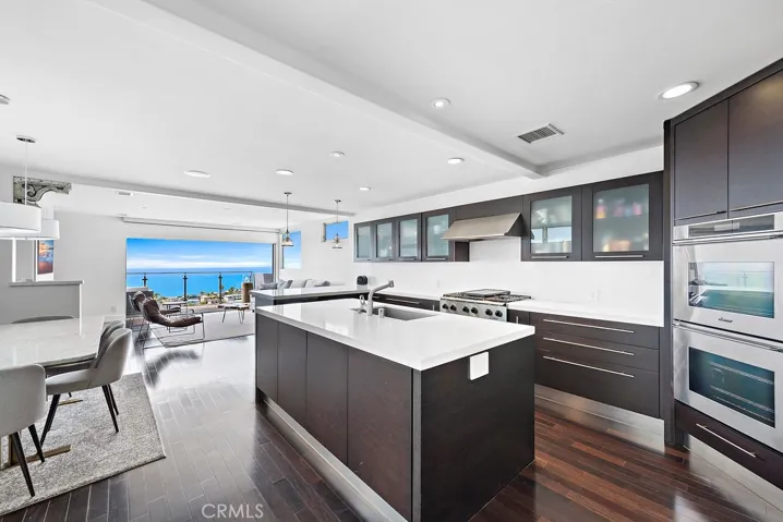 The kitchen is especially large.  It is a chef's delight, with a 6 burner range, two ovens and a jumbo island!