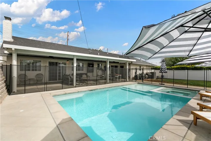 Nice sized pool with room enough for grass for a trampoline or swing set
