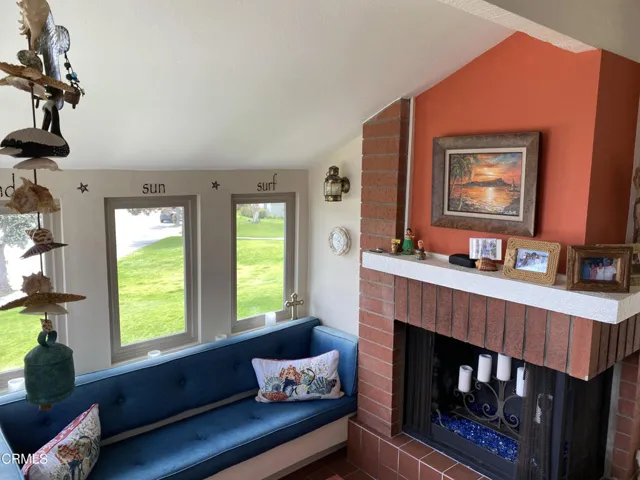 Fireplace and seating with harbor peeks