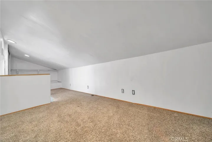 Bonus room/storage or kids playroom. Not included in total sf.